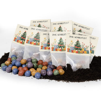 Mehrere Blumenmurmeln Frohe Weihnachtszeit als Geschenkset arrangiert