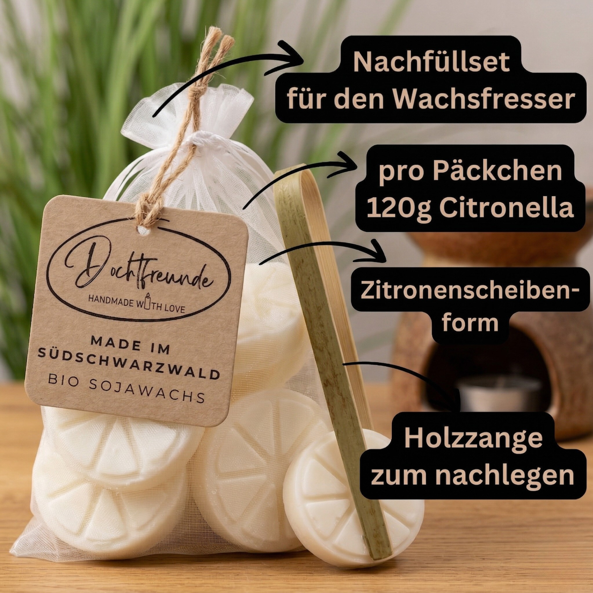 Wachsfresser im Glas mit Holzzange und Holzdeckel